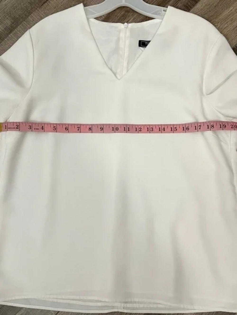 Tiffany's Classic White V-Neck Blouse - Picture 8 of 8